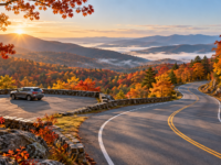 Autumn forest and Appalachian hills beside a winding road and a designated scenic overlook